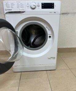 A white, front-loading washing machine from the brand Indesit—part of the "MyTime" range—featuring a 7 kg capacity and a spin speed of 1200 rpm. - Image 7