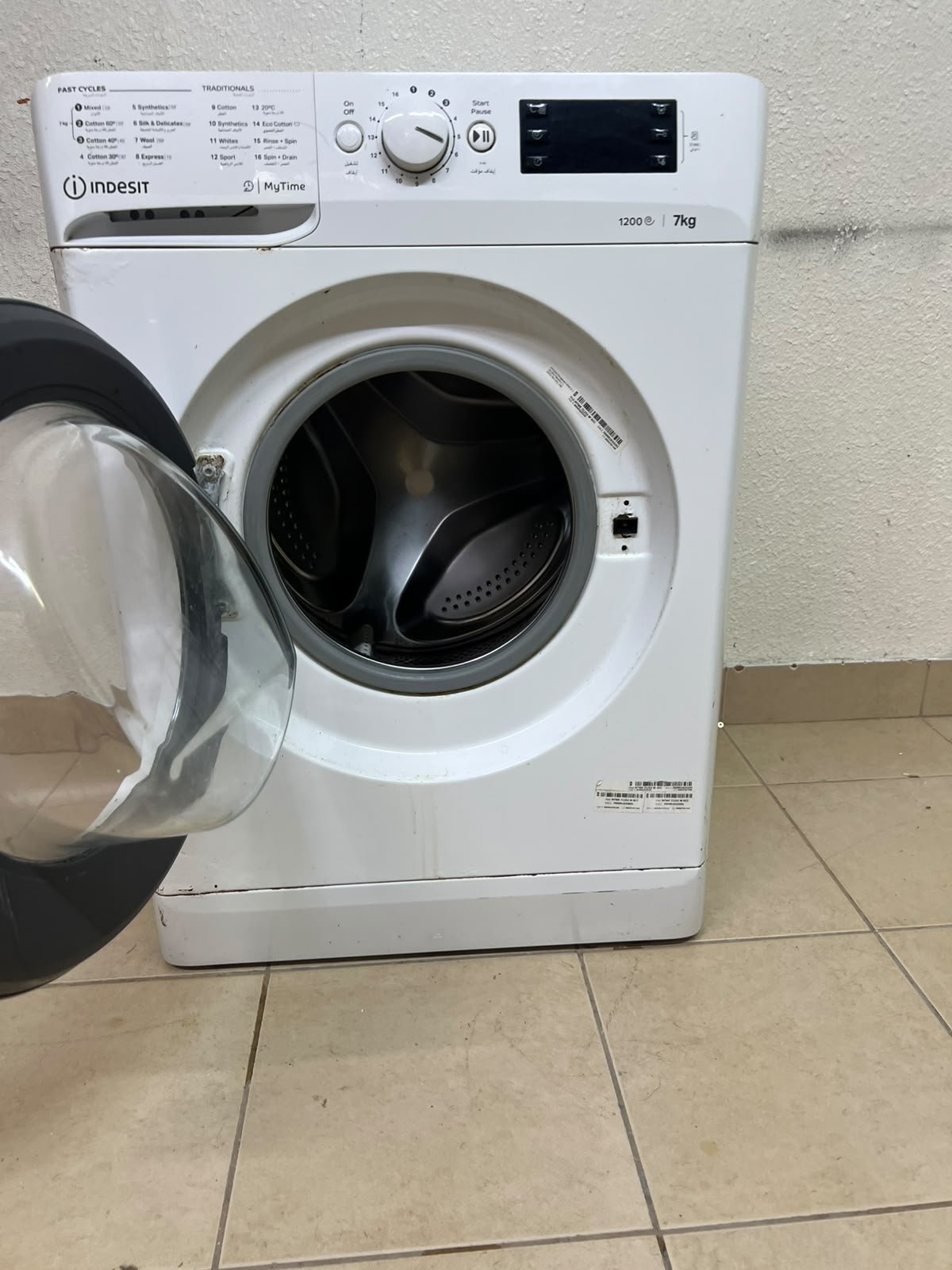 A white, front-loading washing machine from the brand Indesit—part of the "MyTime" range—featuring a 7 kg capacity and a spin speed of 1200 rpm. - Image 7