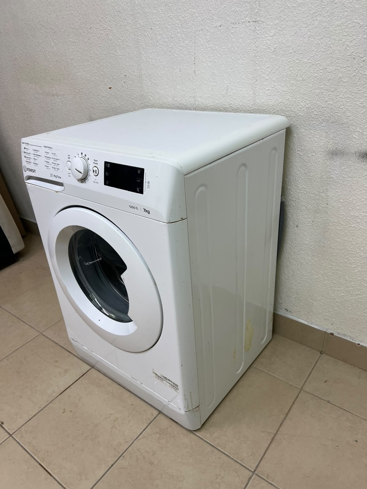 A white, front-loading washing machine from the brand Indesit—part of the "MyTime" range—featuring a 7 kg capacity and a spin speed of 1200 rpm. - Image 6