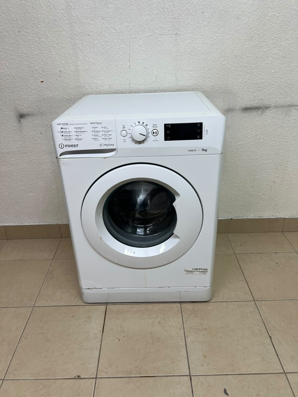A white, front-loading washing machine from the brand Indesit—part of the "MyTime" range—featuring a 7 kg capacity and a spin speed of 1200 rpm.