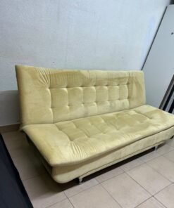 yellow velvet sofa bed with a tufted, segmented design. - Image 8