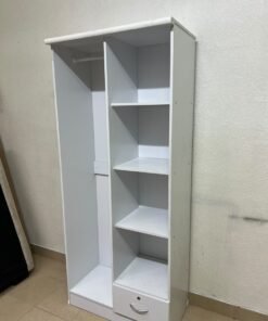 A freestanding, white, geometric wooden wardrobe (closet). - Image 3