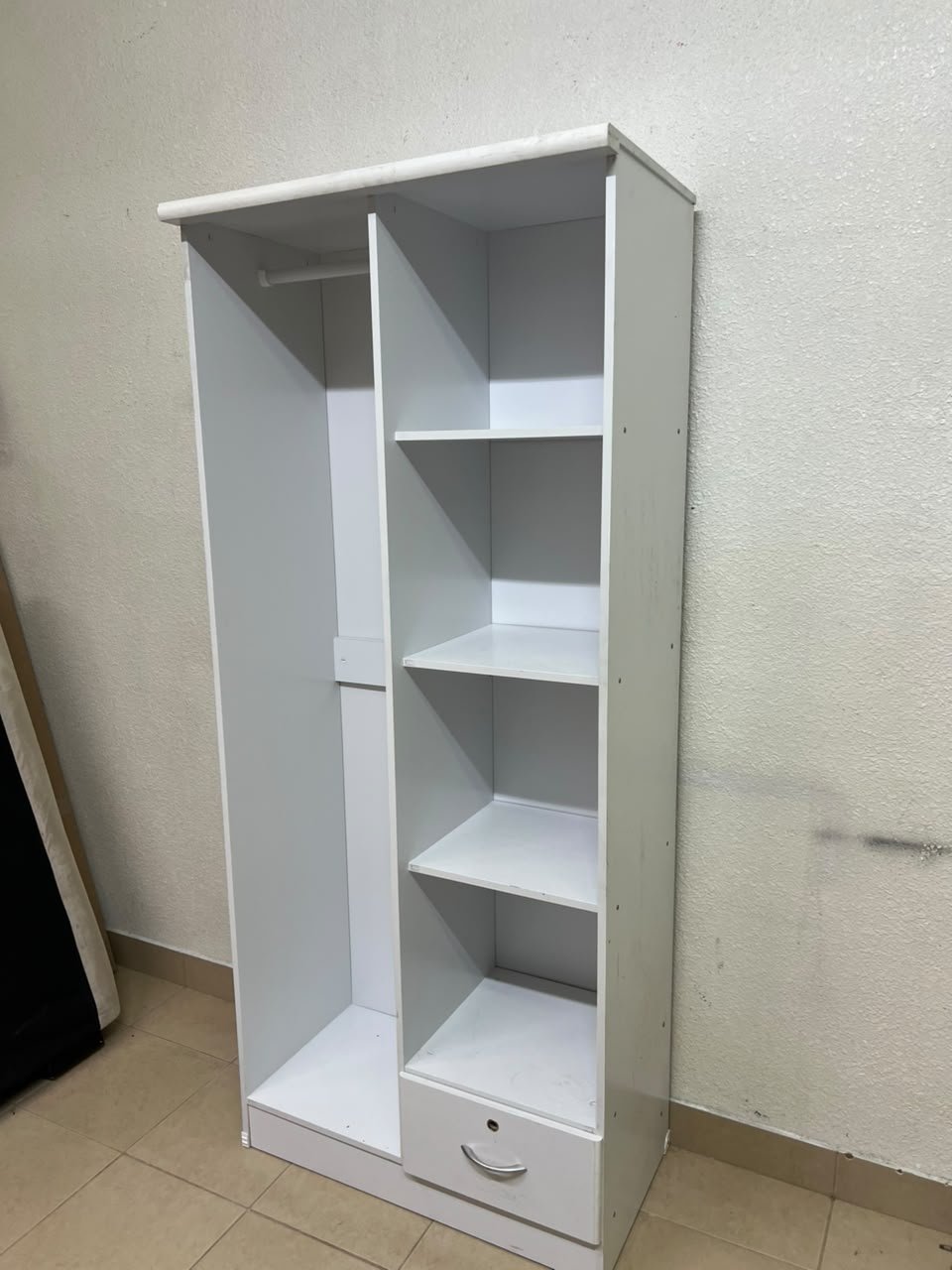 A freestanding, white, geometric wooden wardrobe (closet). - Image 3