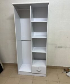 A freestanding, white, geometric wooden wardrobe (closet). - Image 6