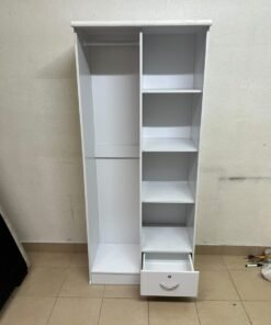 A freestanding, white, geometric wooden wardrobe (closet). - Image 8