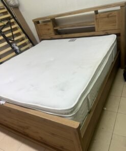 A modern-style wooden double bed (king or queen size) with a mattress, featuring a headboard equipped with shelves and storage cabinets—from Home Centre. - Image 3