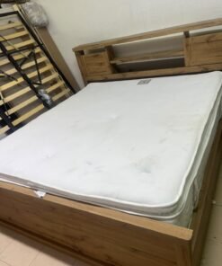 A modern-style wooden double bed (king or queen size) with a mattress, featuring a headboard equipped with shelves and storage cabinets—from Home Centre. - Image 4