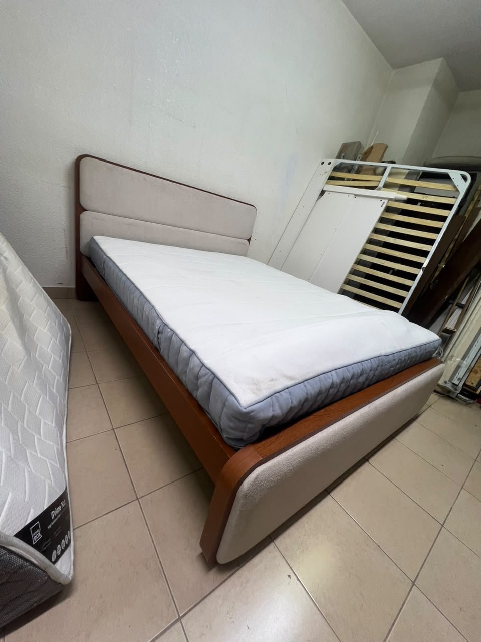 A bed with a mattress, featuring a solid wood frame—such as the "Oboro" or "Nordome" models available at Danube Home—in a super king size (160×200 cm), finished in beige with a brown wooden frame. - Image 4