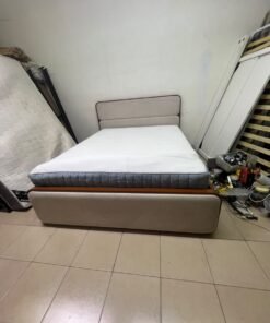 A bed with a mattress, featuring a solid wood frame—such as the "Oboro" or "Nordome" models available at Danube Home—in a super king size (160×200 cm), finished in beige with a brown wooden frame. - Image 8