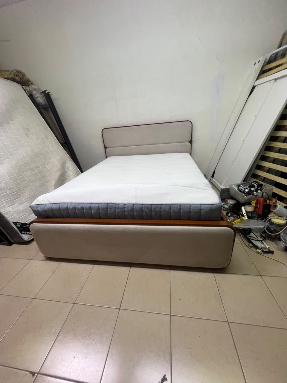 A bed with a mattress, featuring a solid wood frame—such as the "Oboro" or "Nordome" models available at Danube Home—in a super king size (160×200 cm), finished in beige with a brown wooden frame. - Image 8