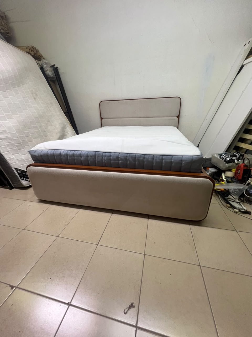A bed with a mattress, featuring a solid wood frame—such as the "Oboro" or "Nordome" models available at Danube Home—in a super king size (160×200 cm), finished in beige with a brown wooden frame. - Image 12
