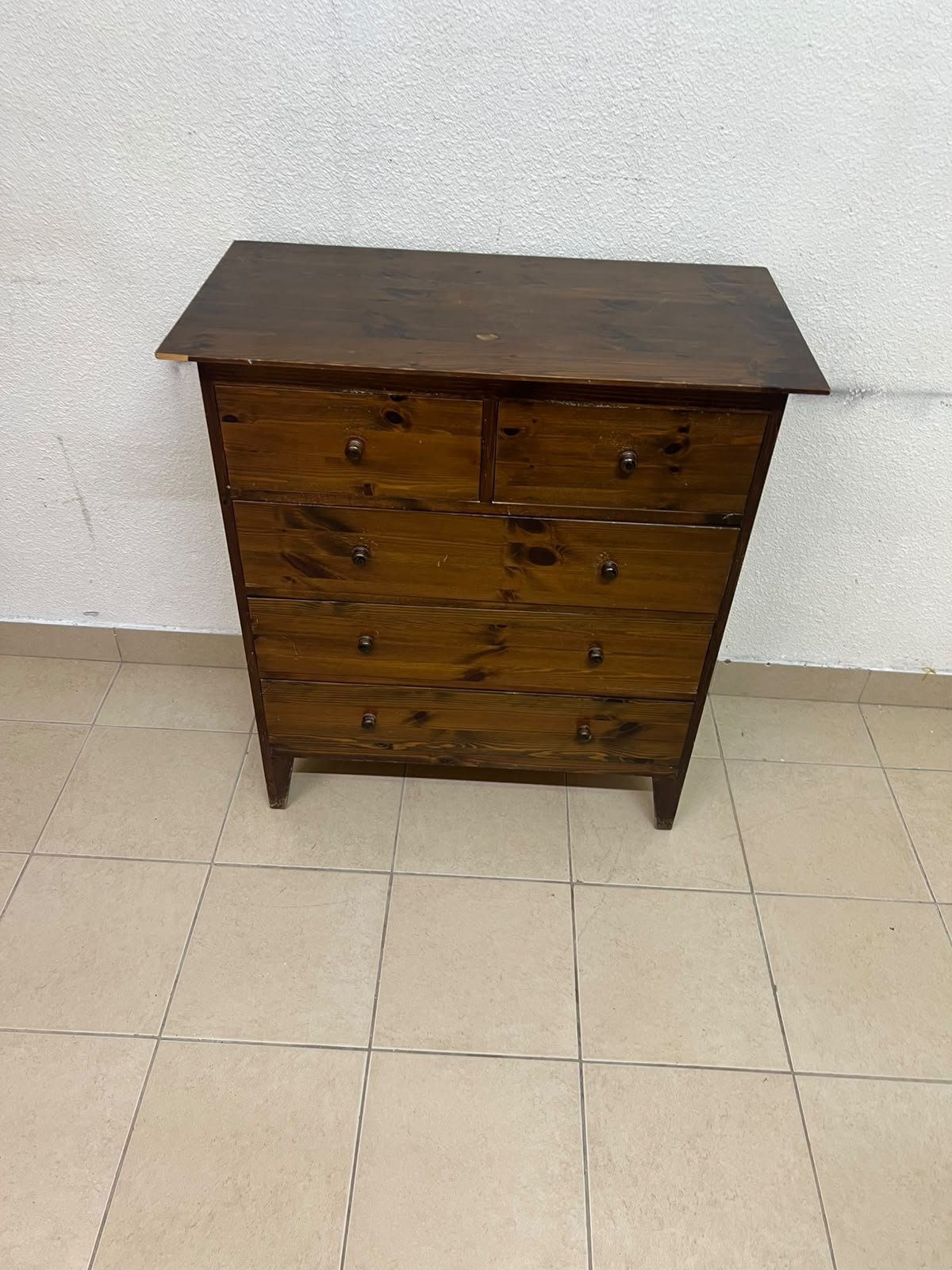 A classic chest of drawers made of solid wood (such as pine or a darker wood), featuring two small drawers at the top and four large, full-width drawers below; it is accented with small, round knobs and elevated wooden legs. - Image 8