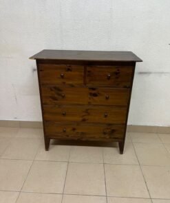 A classic chest of drawers made of solid wood (such as pine or a darker wood), featuring two small drawers at the top and four large, full-width drawers below; it is accented with small, round knobs and elevated wooden legs. - Image 3