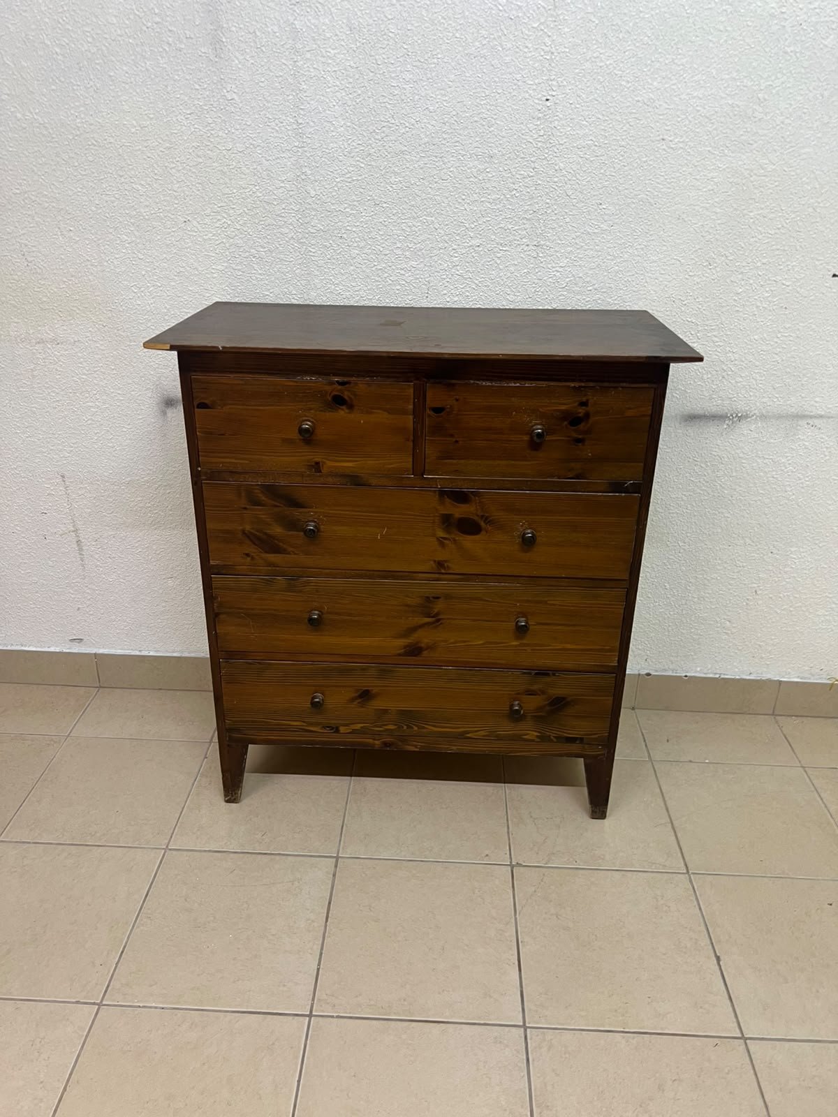 A classic chest of drawers made of solid wood (such as pine or a darker wood), featuring two small drawers at the top and four large, full-width drawers below; it is accented with small, round knobs and elevated wooden legs. - Image 3