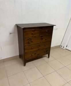 A classic chest of drawers made of solid wood (such as pine or a darker wood), featuring two small drawers at the top and four large, full-width drawers below; it is accented with small, round knobs and elevated wooden legs. - Image 4