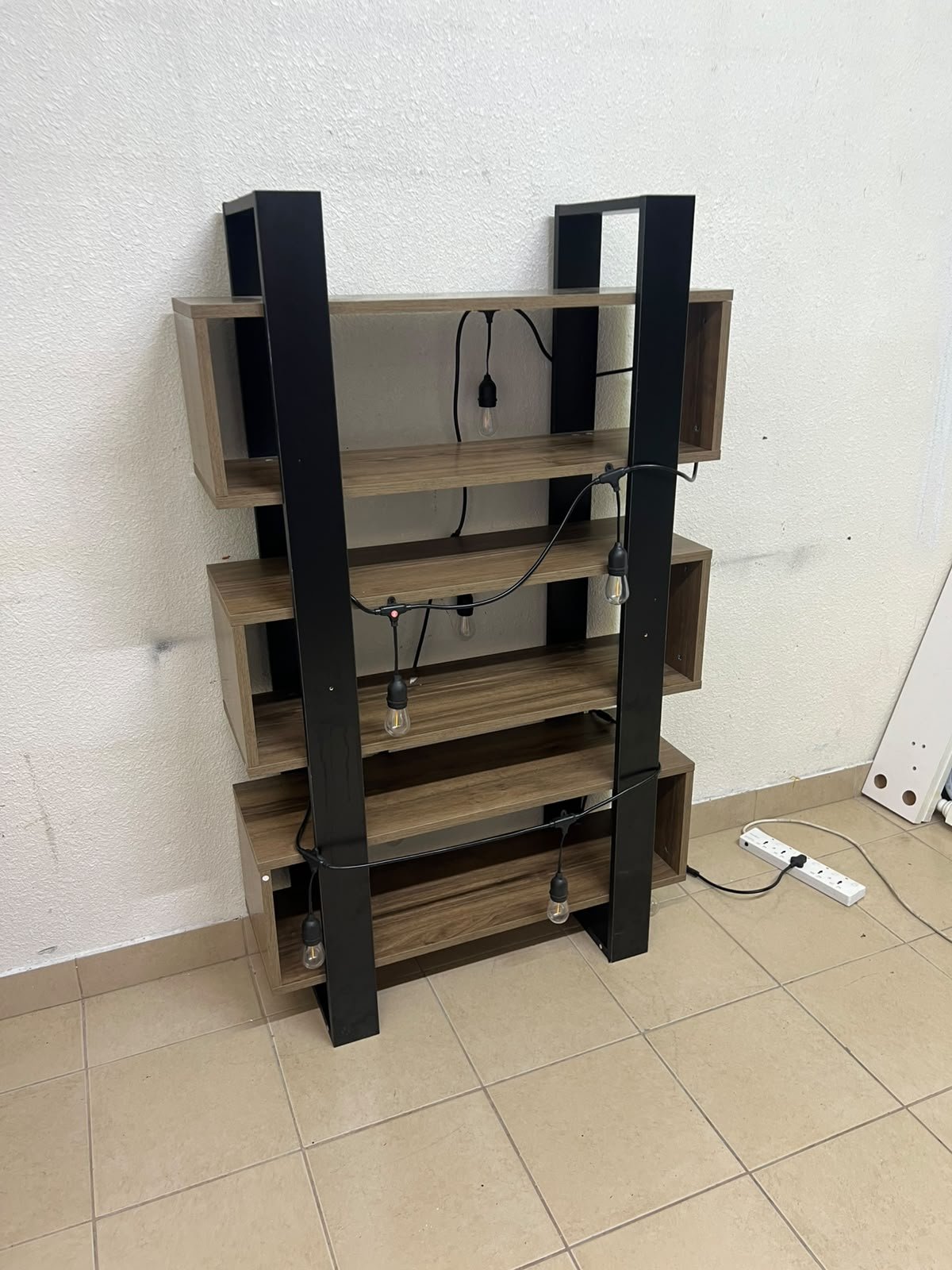 A modern bookcase display unit from the Modulix Opus collection, available at Home Box UAE.