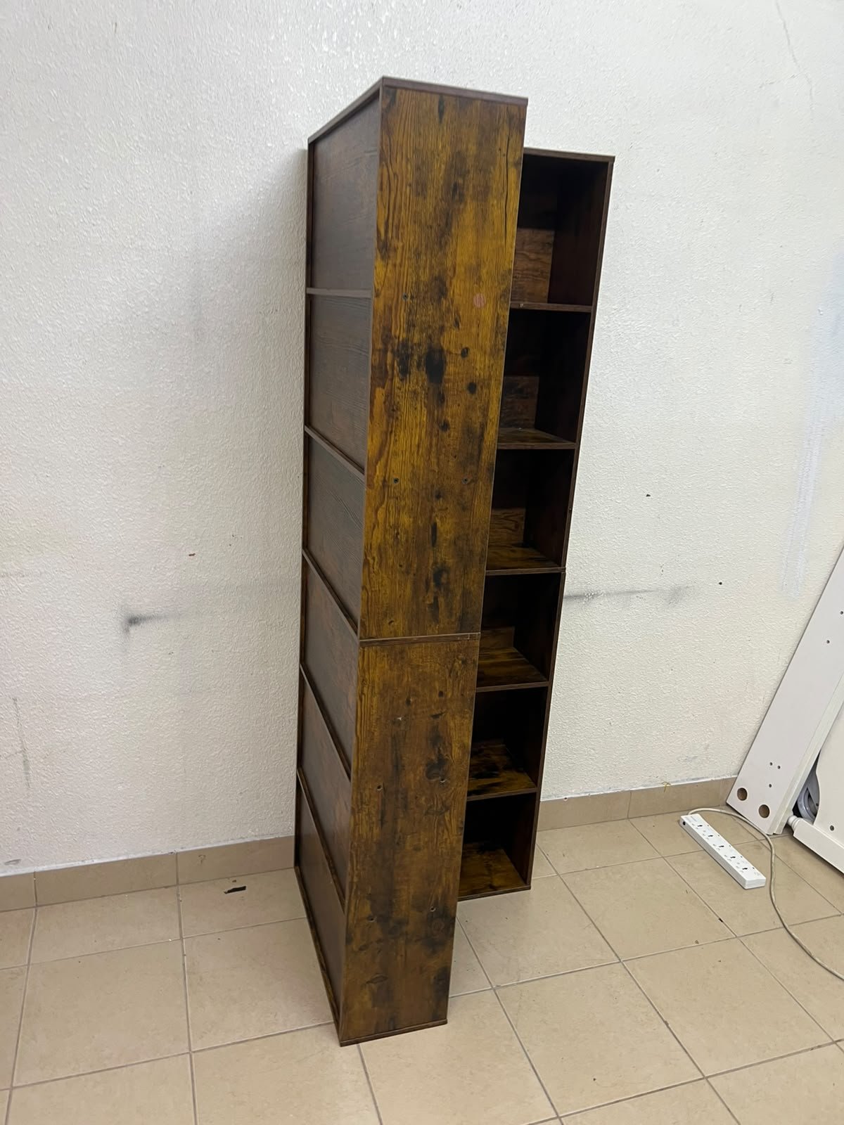 An L-shaped corner bookshelf, crafted from engineered wood in a dark, rustic brown (Vintage/Amber Pine) finish. - Image 7