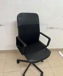 An IKEA swivel office chair known as the RENBERGET swivel chair, in black Bomstad. - Image 3