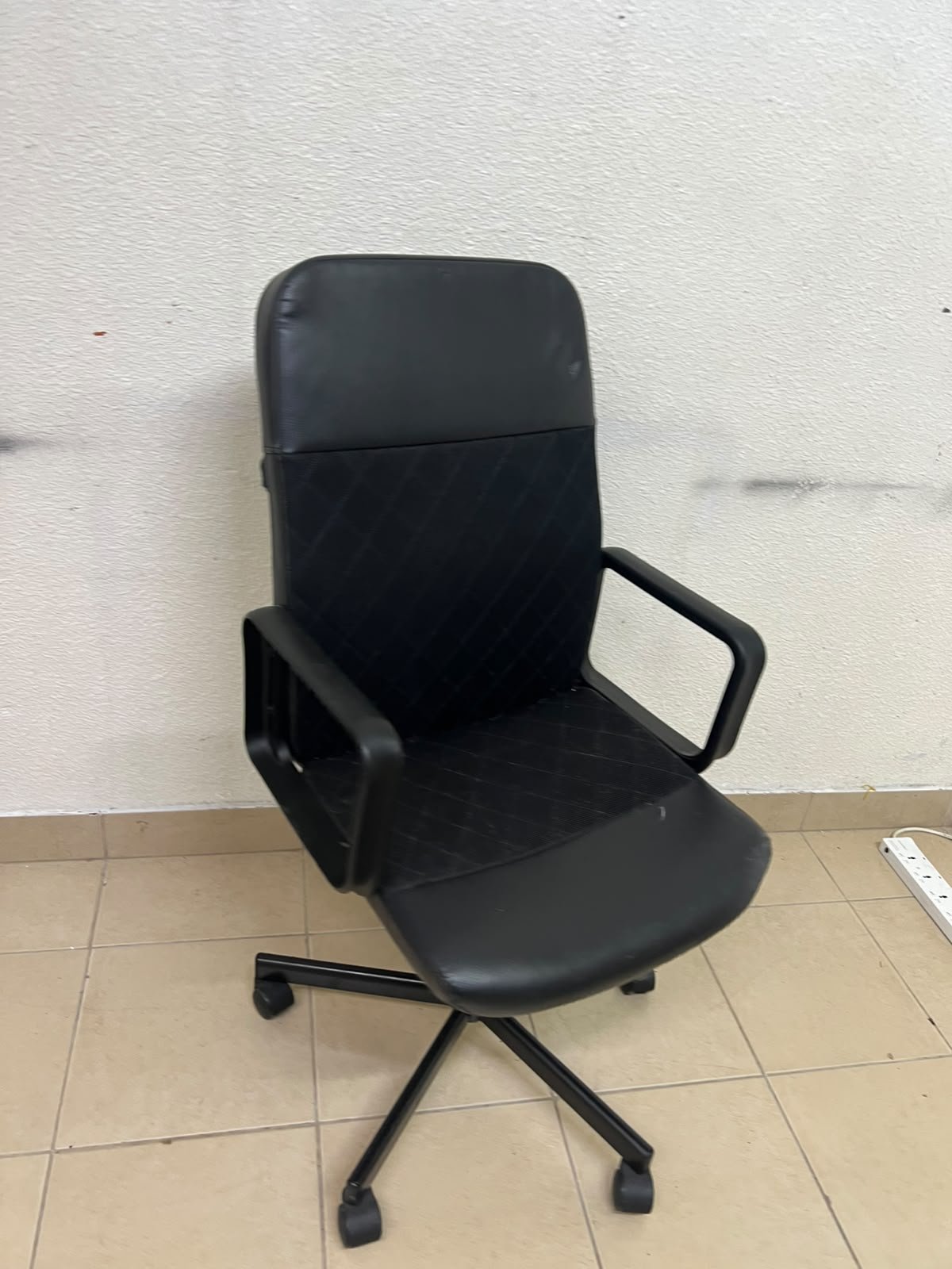 An IKEA swivel office chair known as the RENBERGET swivel chair, in black Bomstad. - Image 3