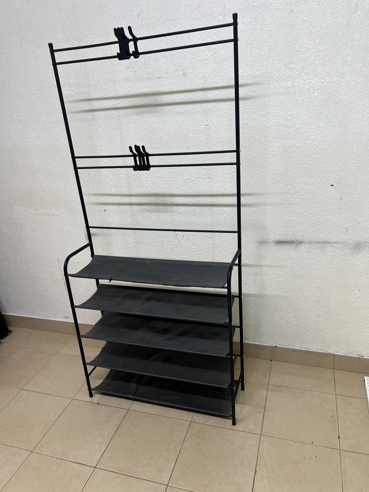 A versatile shoe and clothing organizer (5-tier, featuring top hangers) constructed from metal tubes and fabric storage shelves. - Image 6