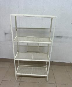 An IKEA shelving unit known as BAGGEBO, made of metal and finished in white.