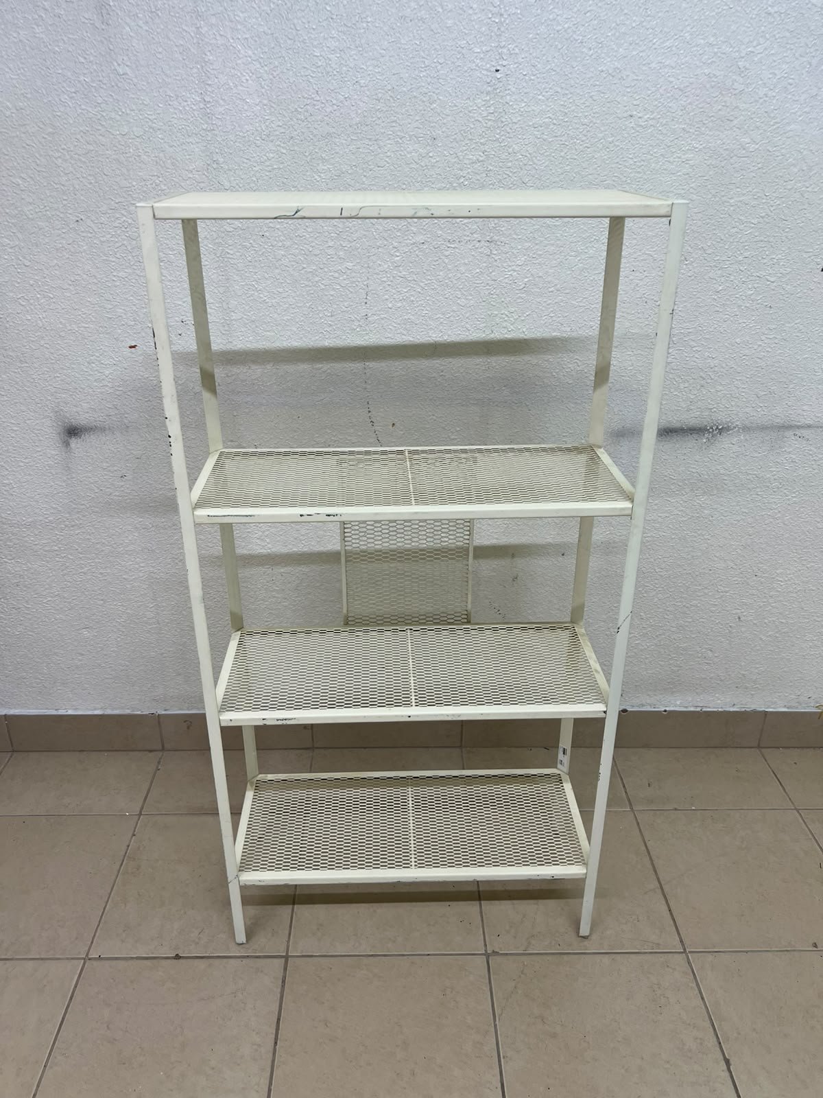 An IKEA shelving unit known as BAGGEBO, made of metal and finished in white. - Image 9