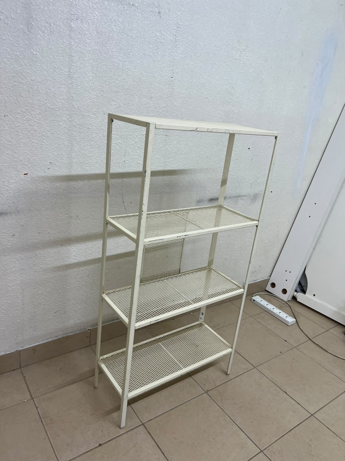 An IKEA shelving unit known as BAGGEBO, made of metal and finished in white. - Image 3