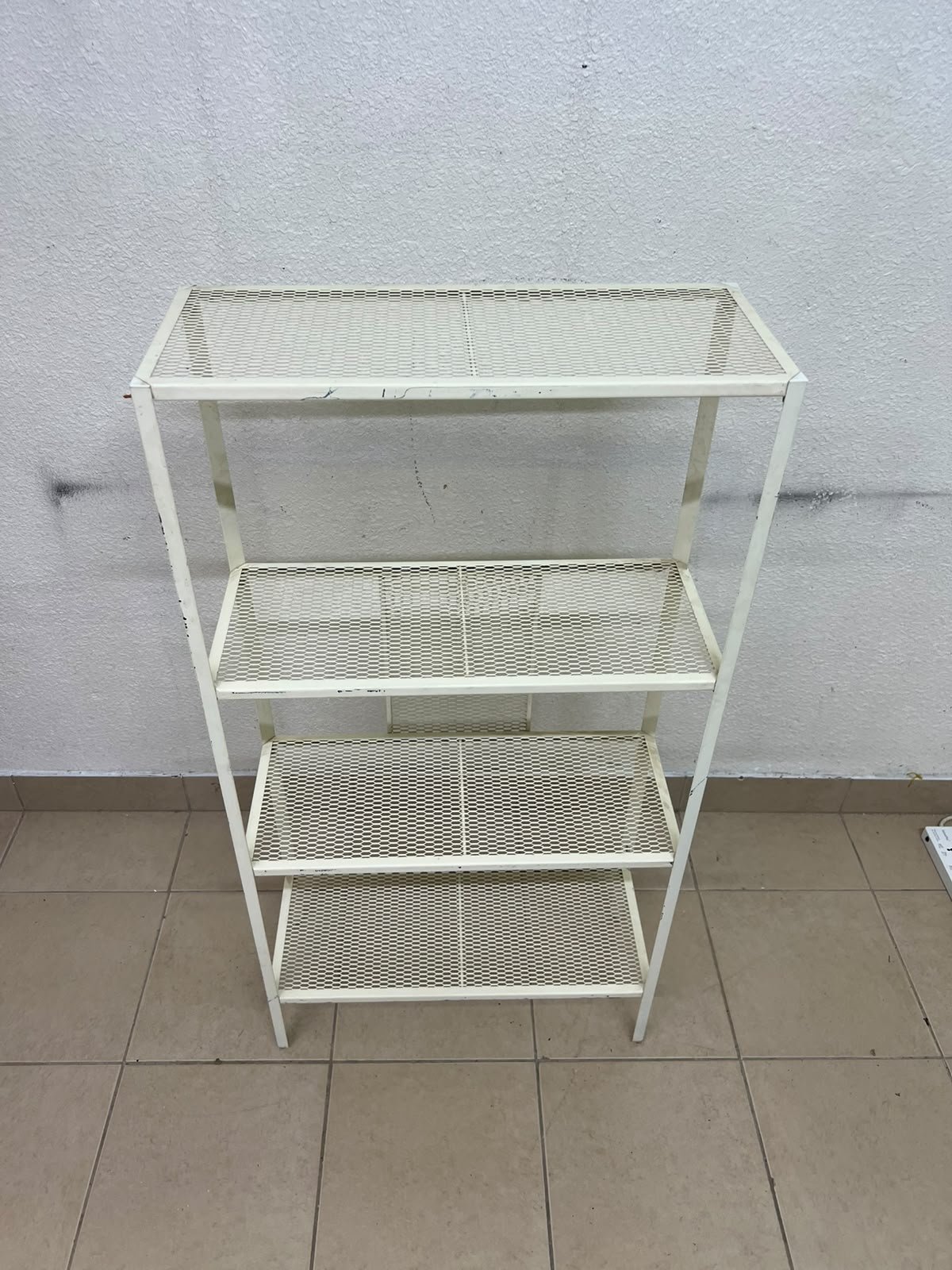 An IKEA shelving unit known as BAGGEBO, made of metal and finished in white. - Image 4