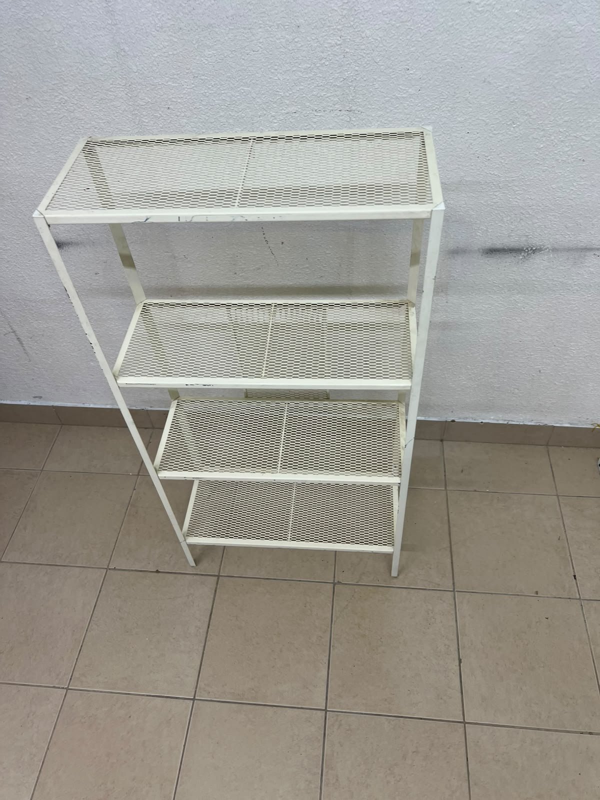 An IKEA shelving unit known as BAGGEBO, made of metal and finished in white. - Image 5