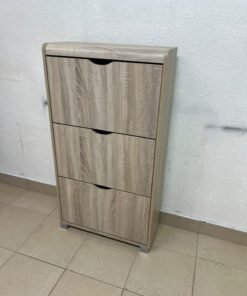 Slim 3-drawer shoe cabinet with a fold-out design, in a natural oak finish.