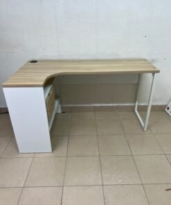 An L-shaped corner desk in white, featuring a light wood-tone (oak) surface and two drawers, complete with side storage units that include two drawers and open shelving. - Image 2