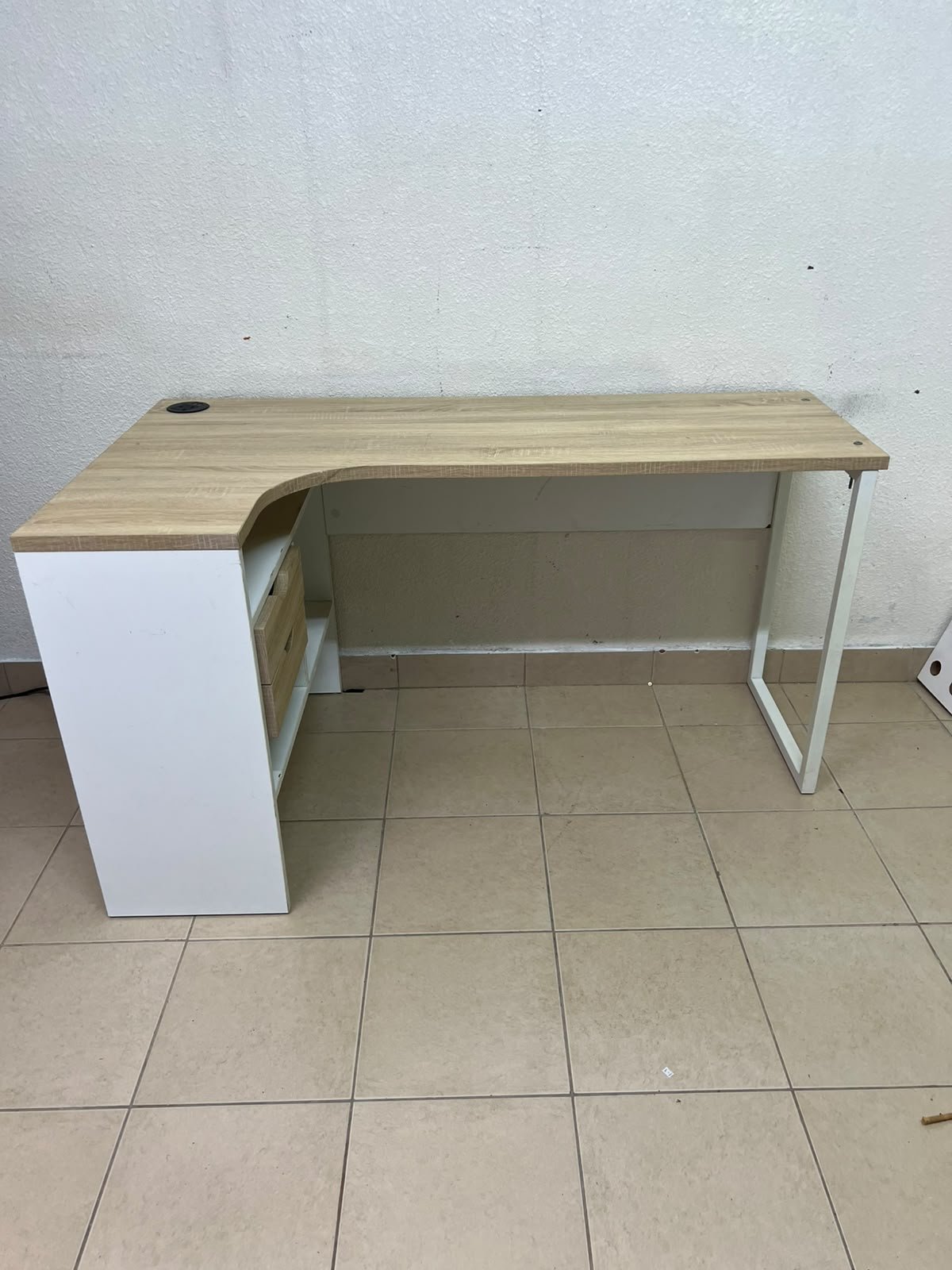 An L-shaped corner desk in white, featuring a light wood-tone (oak) surface and two drawers, complete with side storage units that include two drawers and open shelving. - Image 2
