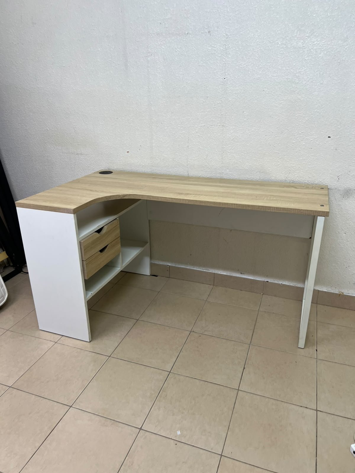 An L-shaped corner desk in white, featuring a light wood-tone (oak) surface and two drawers, complete with side storage units that include two drawers and open shelving. - Image 4