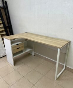 An L-shaped corner desk in white, featuring a light wood-tone (oak) surface and two drawers, complete with side storage units that include two drawers and open shelving.