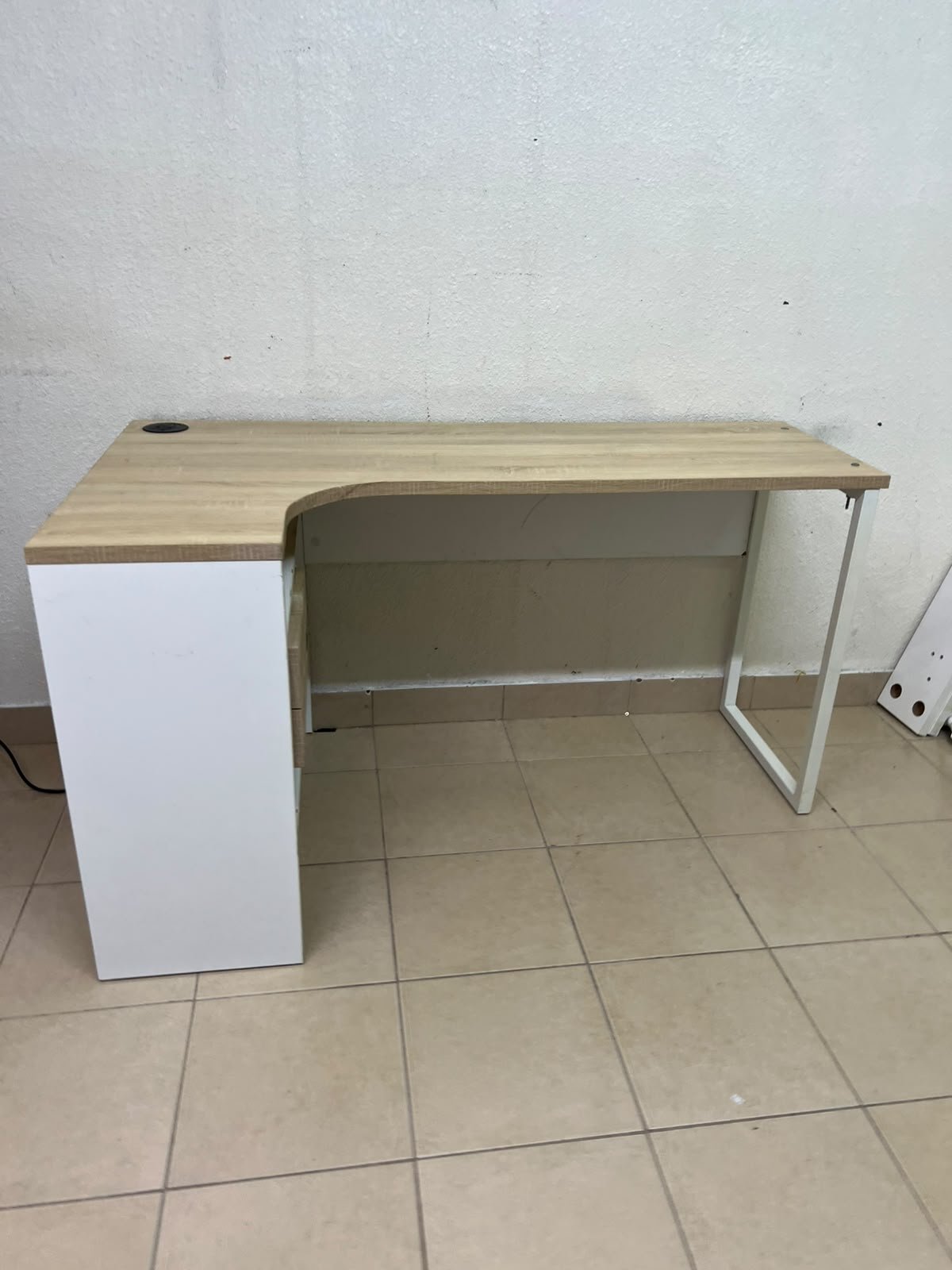 An L-shaped corner desk in white, featuring a light wood-tone (oak) surface and two drawers, complete with side storage units that include two drawers and open shelving. - Image 11