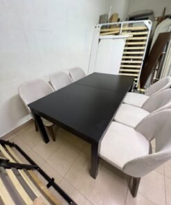 Dining table with 6 chairs: a black, rectangular, extendable wooden table paired with upholstered chairs in a light beige color – an IKEA dining set. - Image 5