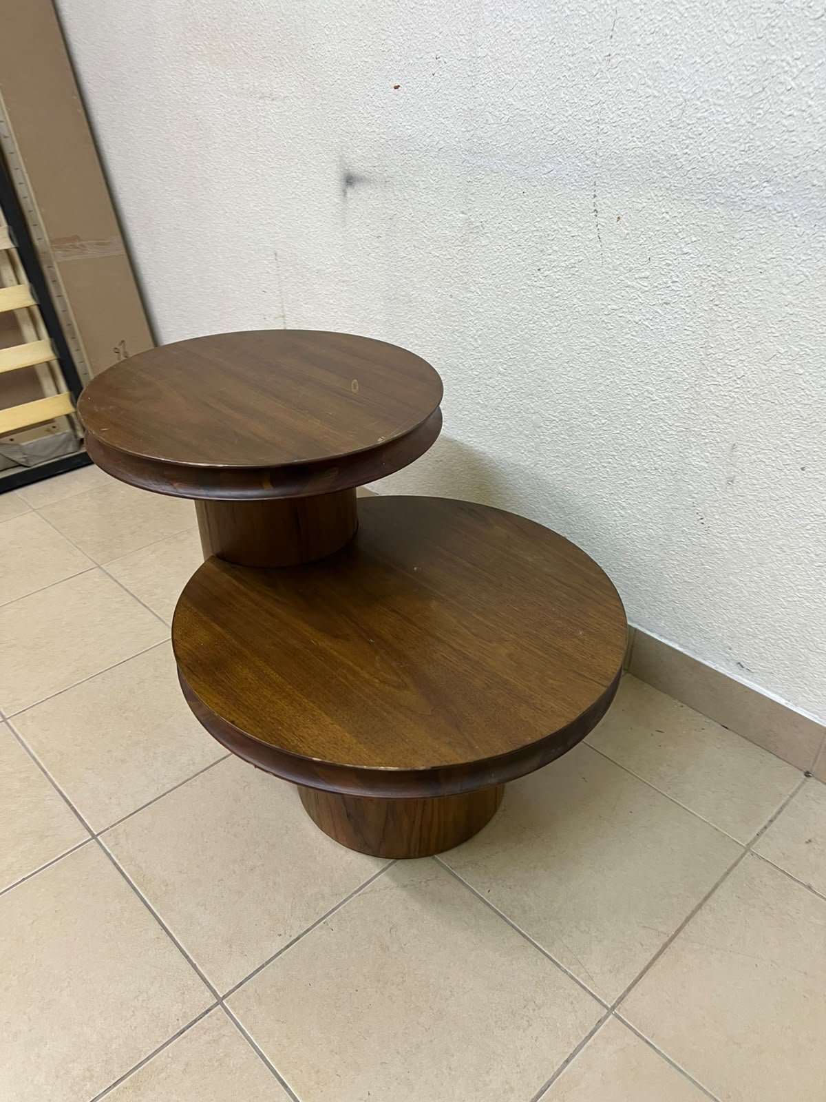 A two-tier side table crafted from natural walnut, featuring a mid-century inspired design—reminiscent of iconic pieces such as the "Oro" table from Crate & Barrel or Scandinavian-style tiered tables. - Image 3