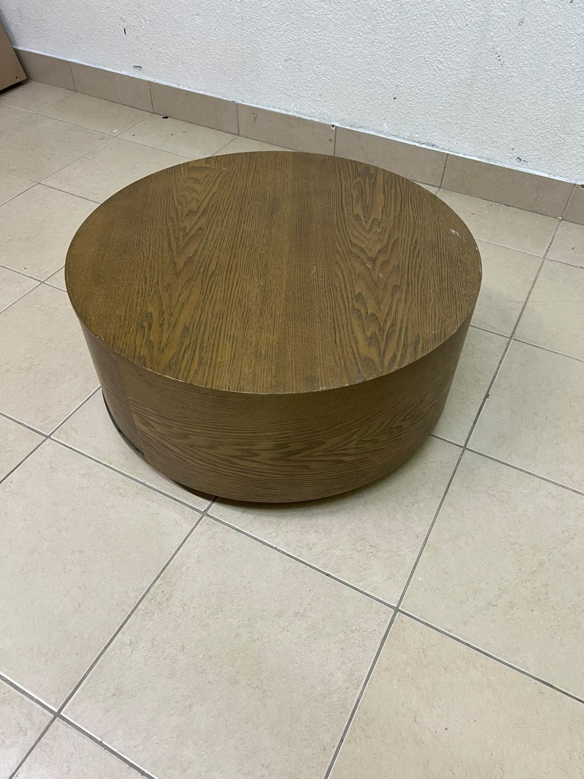 A round, dark oak-colored wooden coffee table, featuring an elegant, modern design with a curved storage drawer equipped with concealed or recessed handles. - Image 5