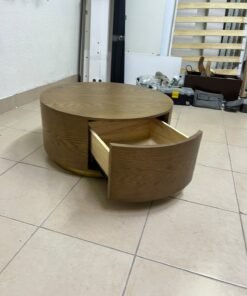 A round, dark oak-colored wooden coffee table, featuring an elegant, modern design with a curved storage drawer equipped with concealed or recessed handles. - Image 6