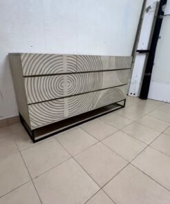 A chest of drawers featuring a geometric design with raised circular patterns—known as the 7-drawer "Circulus" chest from Crate & Barrel, or a very similar design from the "Gerald" collection by Home Centre. - Image 4