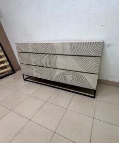 A chest of drawers featuring a geometric design with raised circular patterns—known as the 7-drawer "Circulus" chest from Crate & Barrel, or a very similar design from the "Gerald" collection by Home Centre. - Image 5