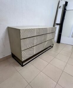 A chest of drawers featuring a geometric design with raised circular patterns—known as the 7-drawer "Circulus" chest from Crate & Barrel, or a very similar design from the "Gerald" collection by Home Centre. - Image 10