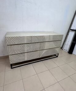 A chest of drawers featuring a geometric design with raised circular patterns—known as the 7-drawer "Circulus" chest from Crate & Barrel, or a very similar design from the "Gerald" collection by Home Centre. - Image 12
