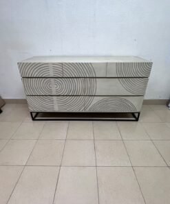 A chest of drawers featuring a geometric design with raised circular patterns—known as the 7-drawer "Circulus" chest from Crate & Barrel, or a very similar design from the "Gerald" collection by Home Centre. - Image 2