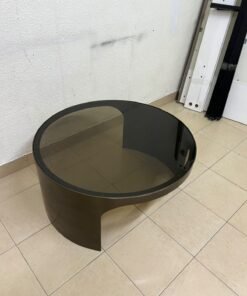 A round coffee table featuring a curved base in a bronze or metallic brown finish, topped with a smoked (tempered) glass surface. - Image 6