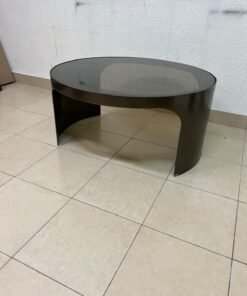 A round coffee table featuring a curved base in a bronze or metallic brown finish, topped with a smoked (tempered) glass surface. - Image 8