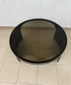 A round coffee table featuring a curved base in a bronze or metallic brown finish, topped with a smoked (tempered) glass surface. - Image 4