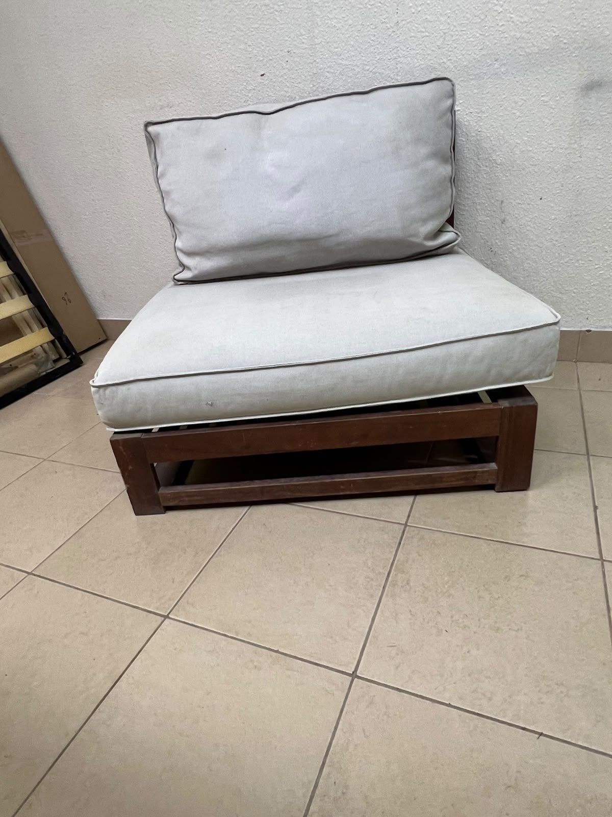 A comfortable chair from the NÄMMARÖ outdoor collection by IKEA UAE, featuring a light brown finish and beige cushions from the Frösön/Duvholmen series. - Image 4