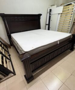 Large, classic double bed (king-size) with mattress, crafted from dark wood and featuring a headboard and footboard adorned with square-patterned detailing. - Image 10