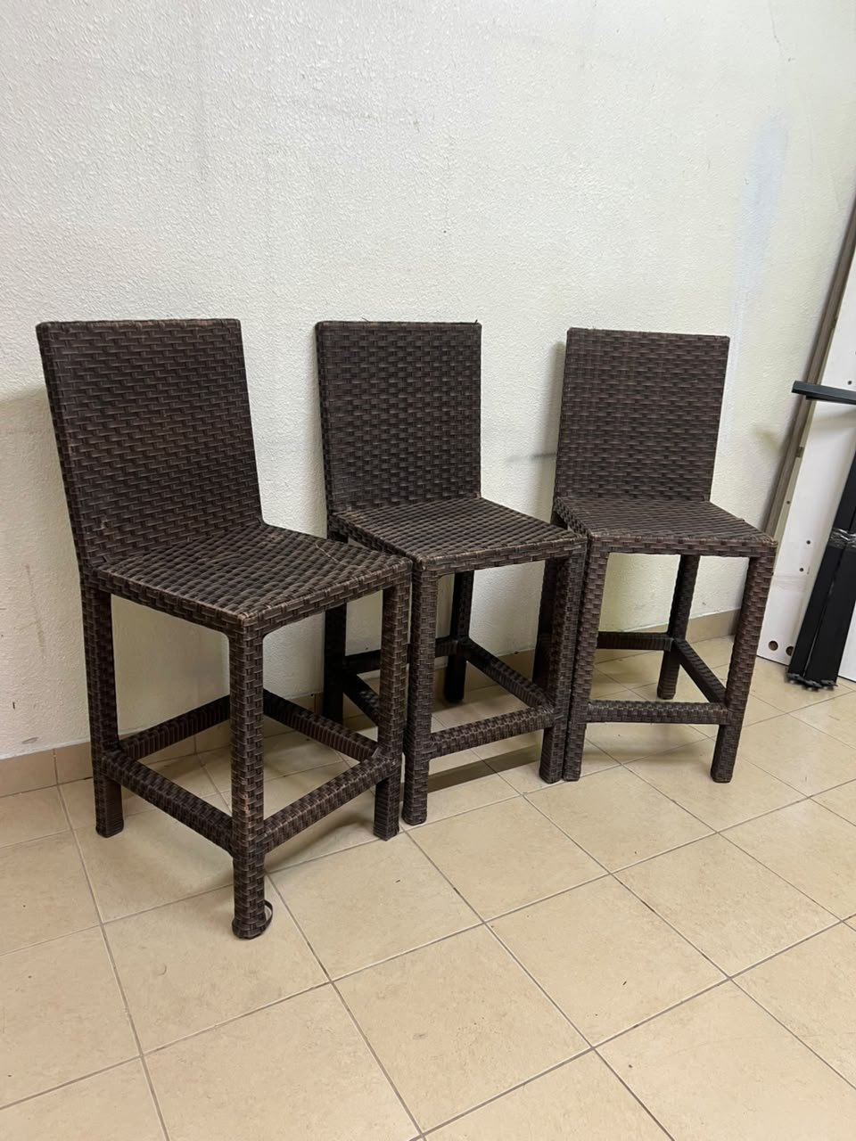 High bar stools made of synthetic rattan (with a woven waist design) in a dark brown color, featuring a high backrest. - Image 4